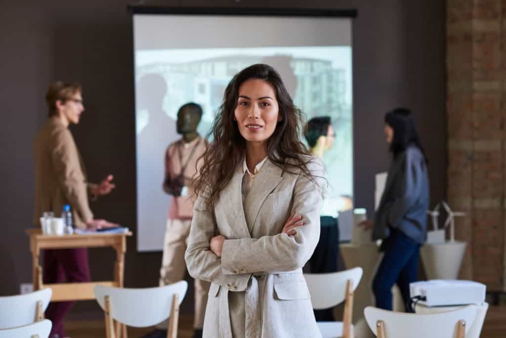 Young businesswoman standing at boardroom